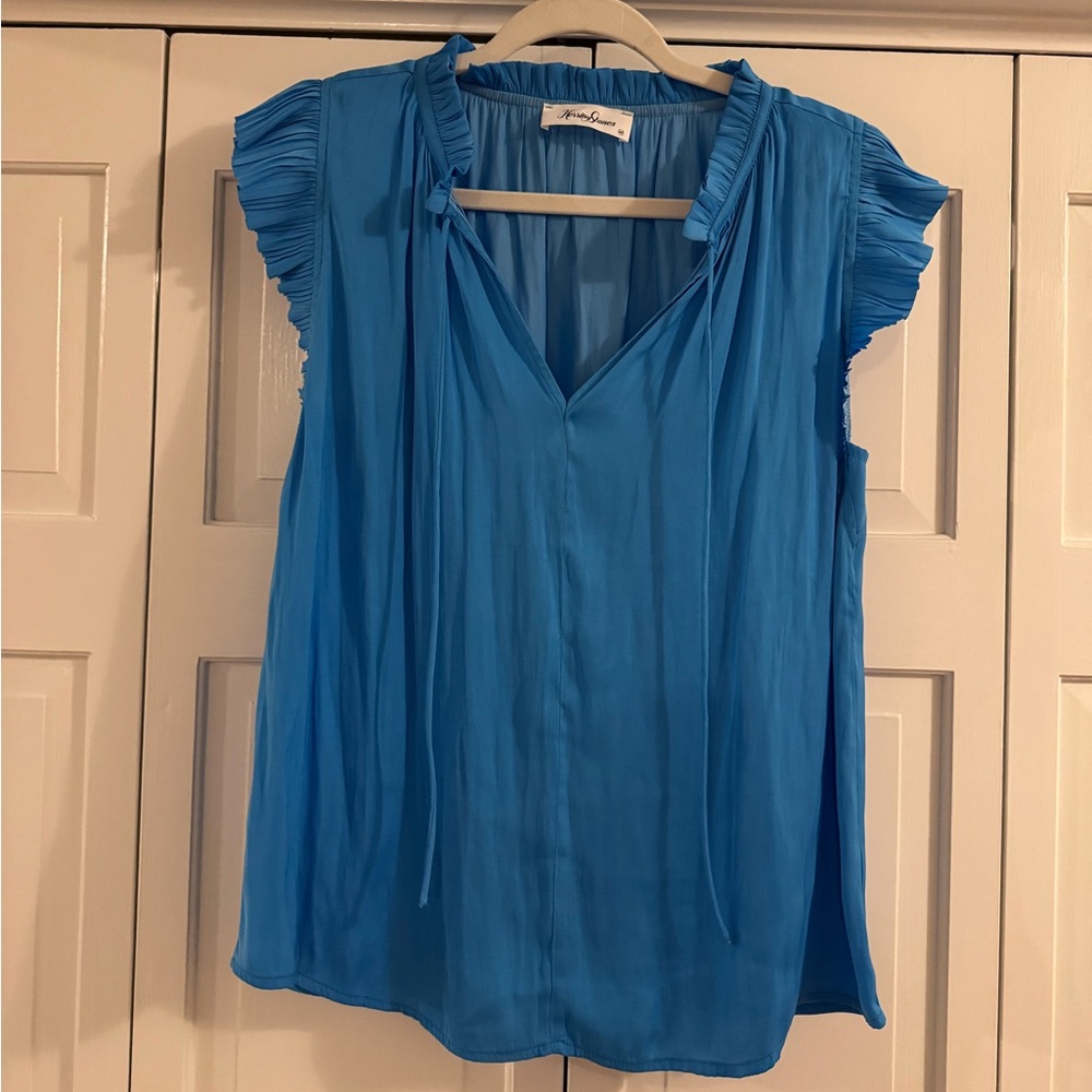 Women’s blue sleeveless blouse